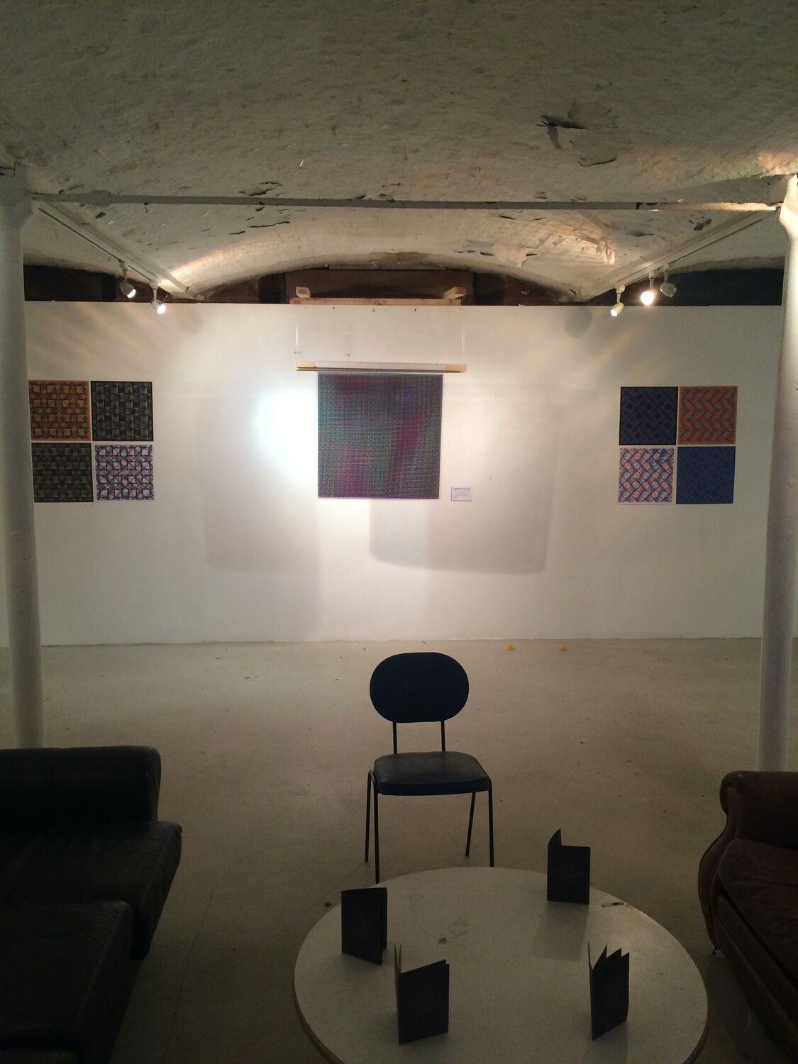 The PI3.14 pattern hung under the brick arches at Islington Mill