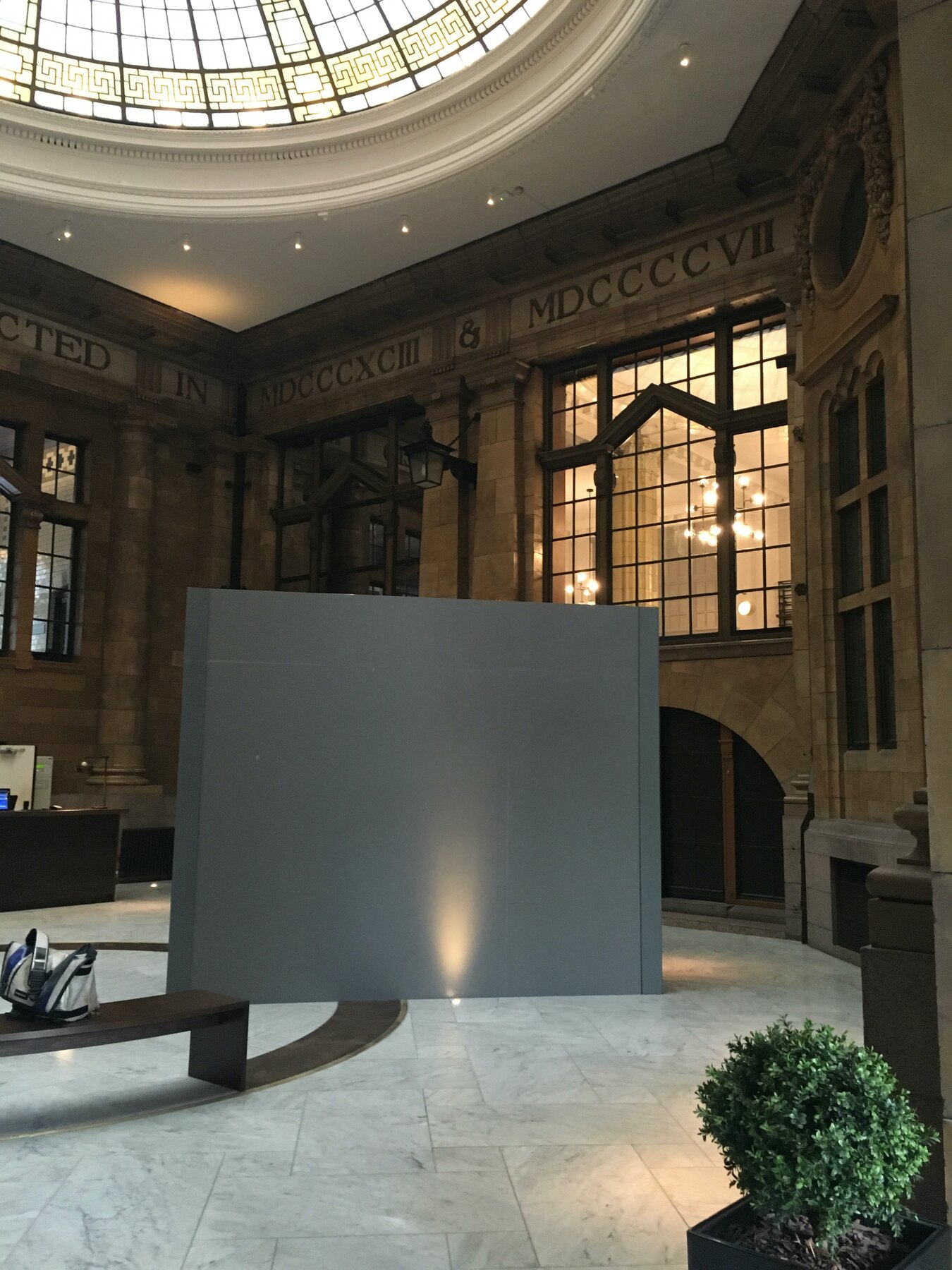 The grey hoarding in the Palace Hotel reception beneath the stained glass dome, June 2016