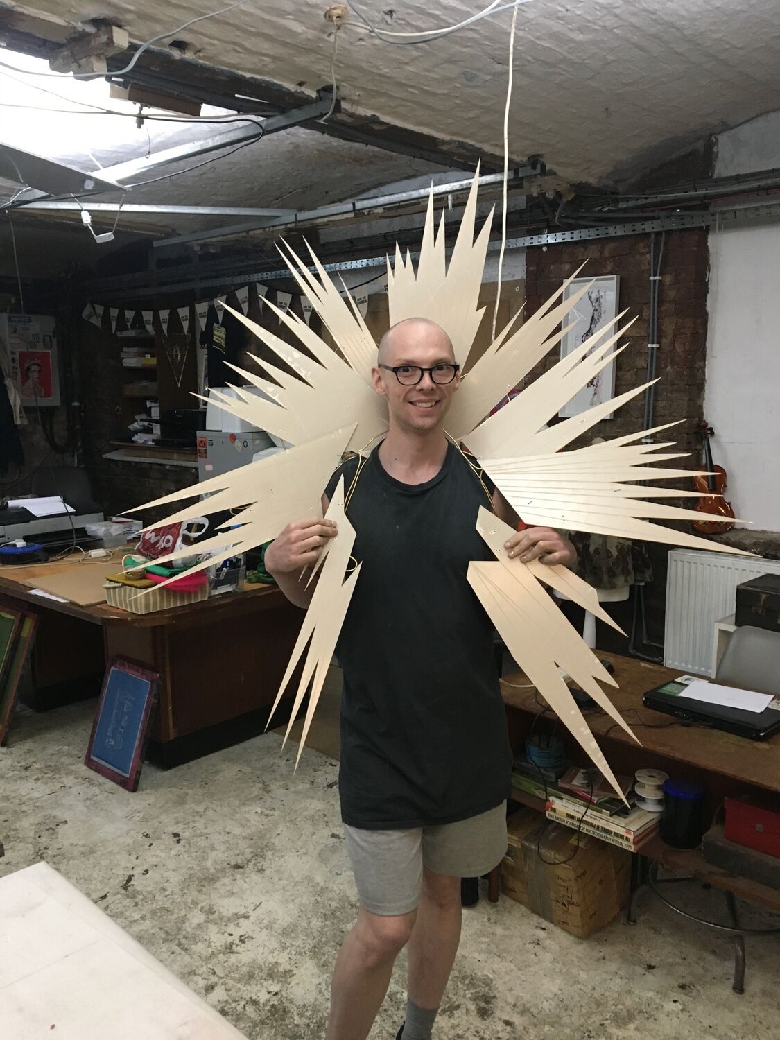 A cream spiked headdress made for Cheddar Gorgeous, in the studio