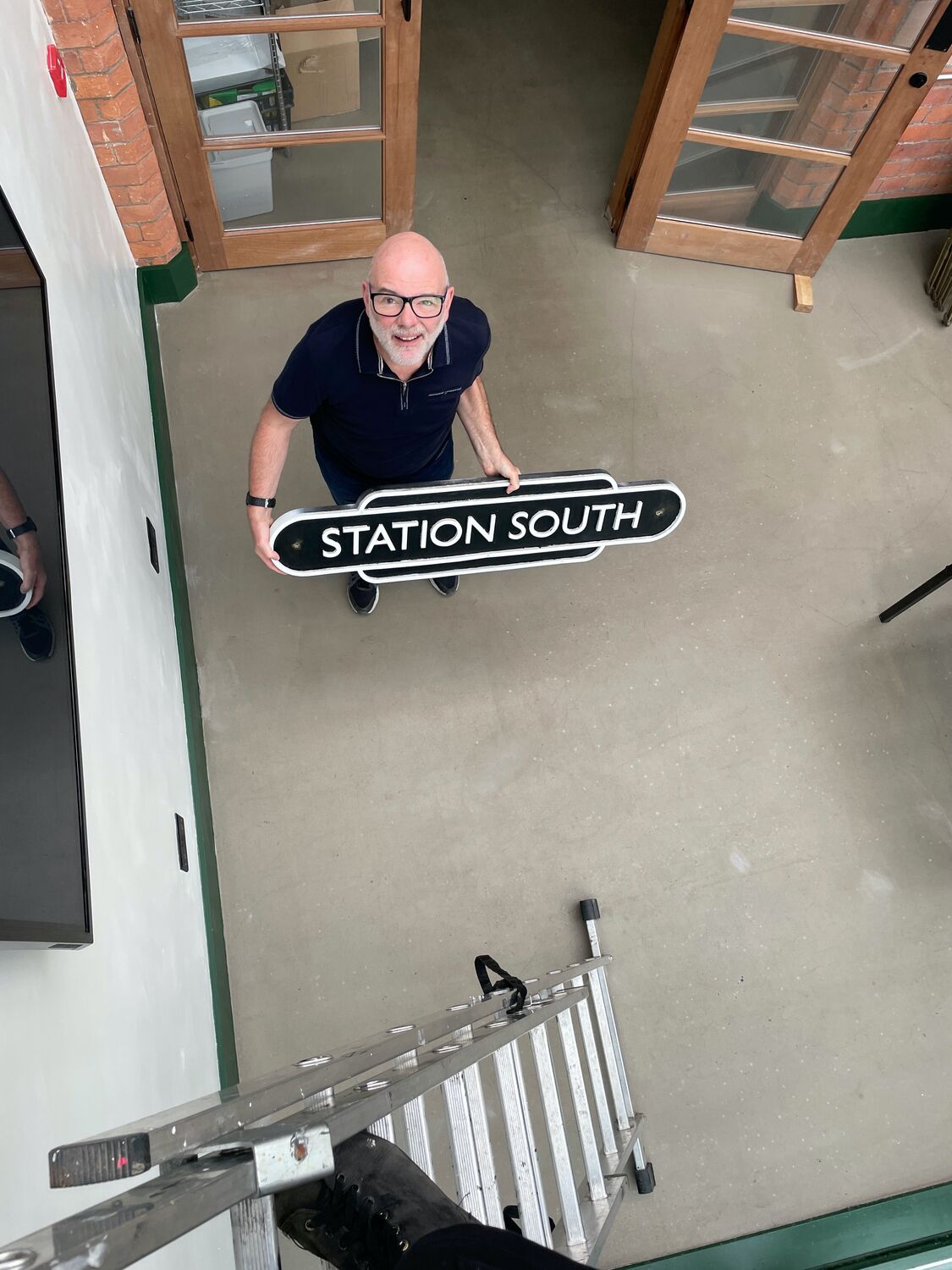 The Station South sign, with my dad, Moderate Studio journal, 2022