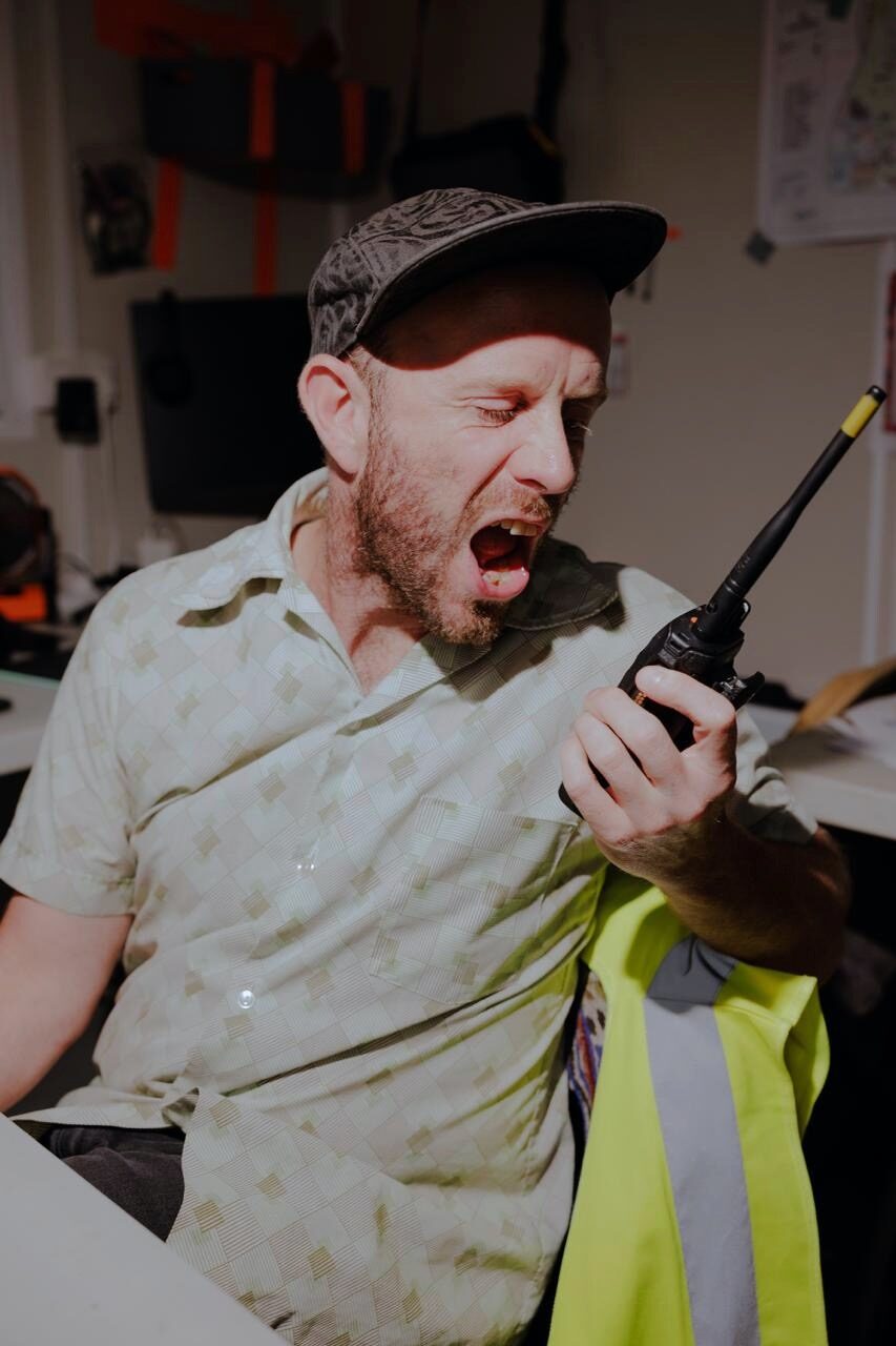 Running the Boomtown photography team by radio from the production office.
