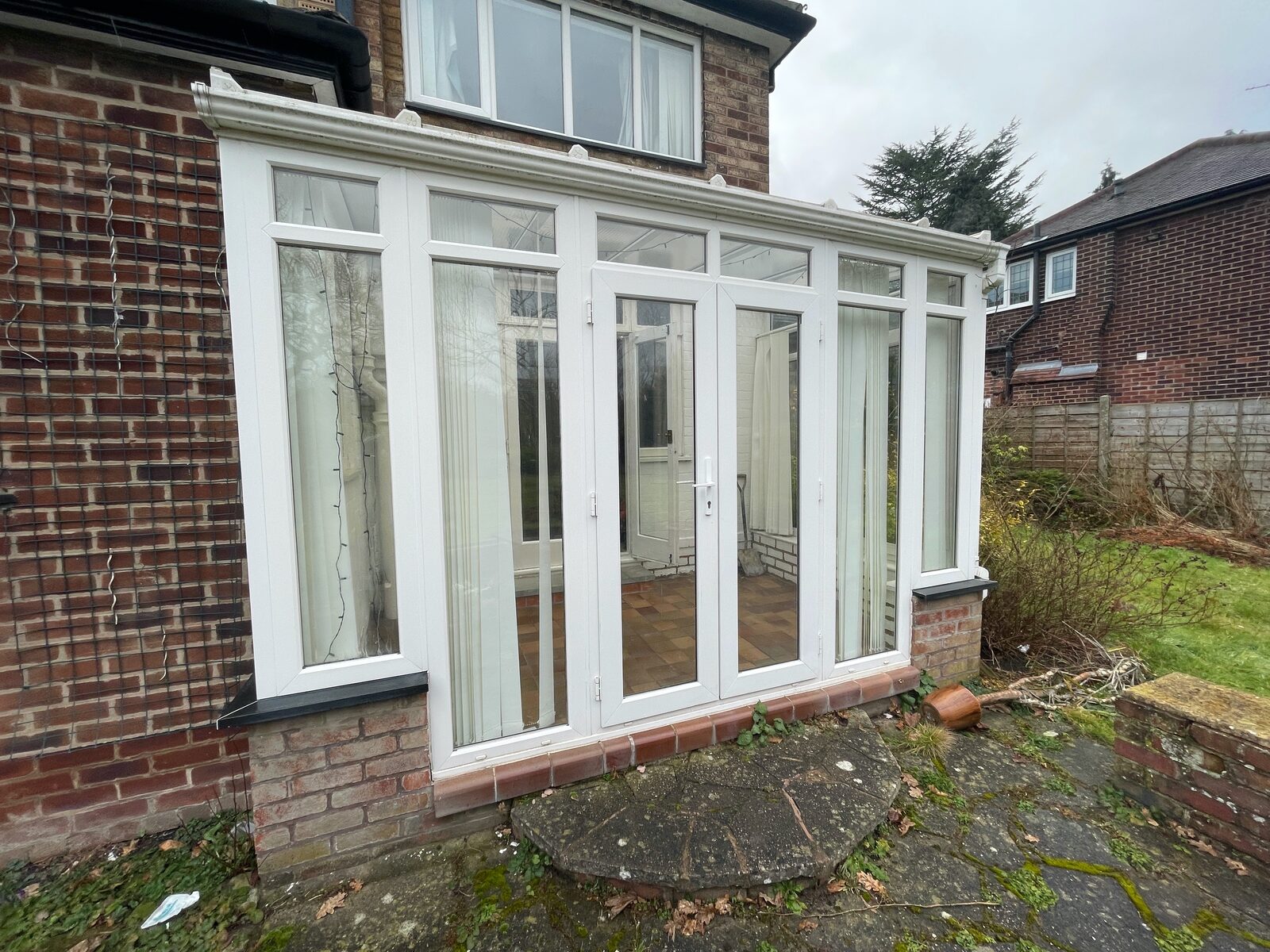The old uPVC conservatory before it came down.