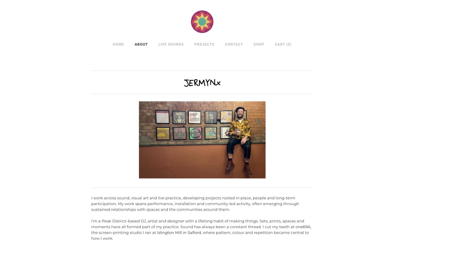 The About page introducing Mark Jermyn against a wall of framed prints