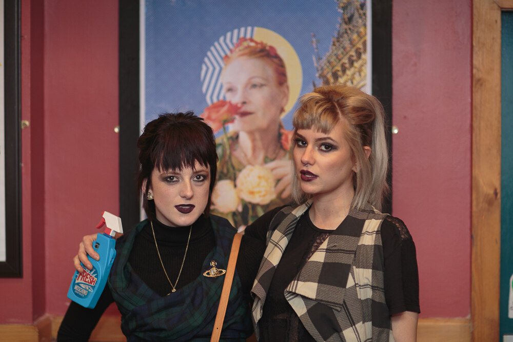 Two guests in Vivienne Westwood inspired outfits at the costume competition