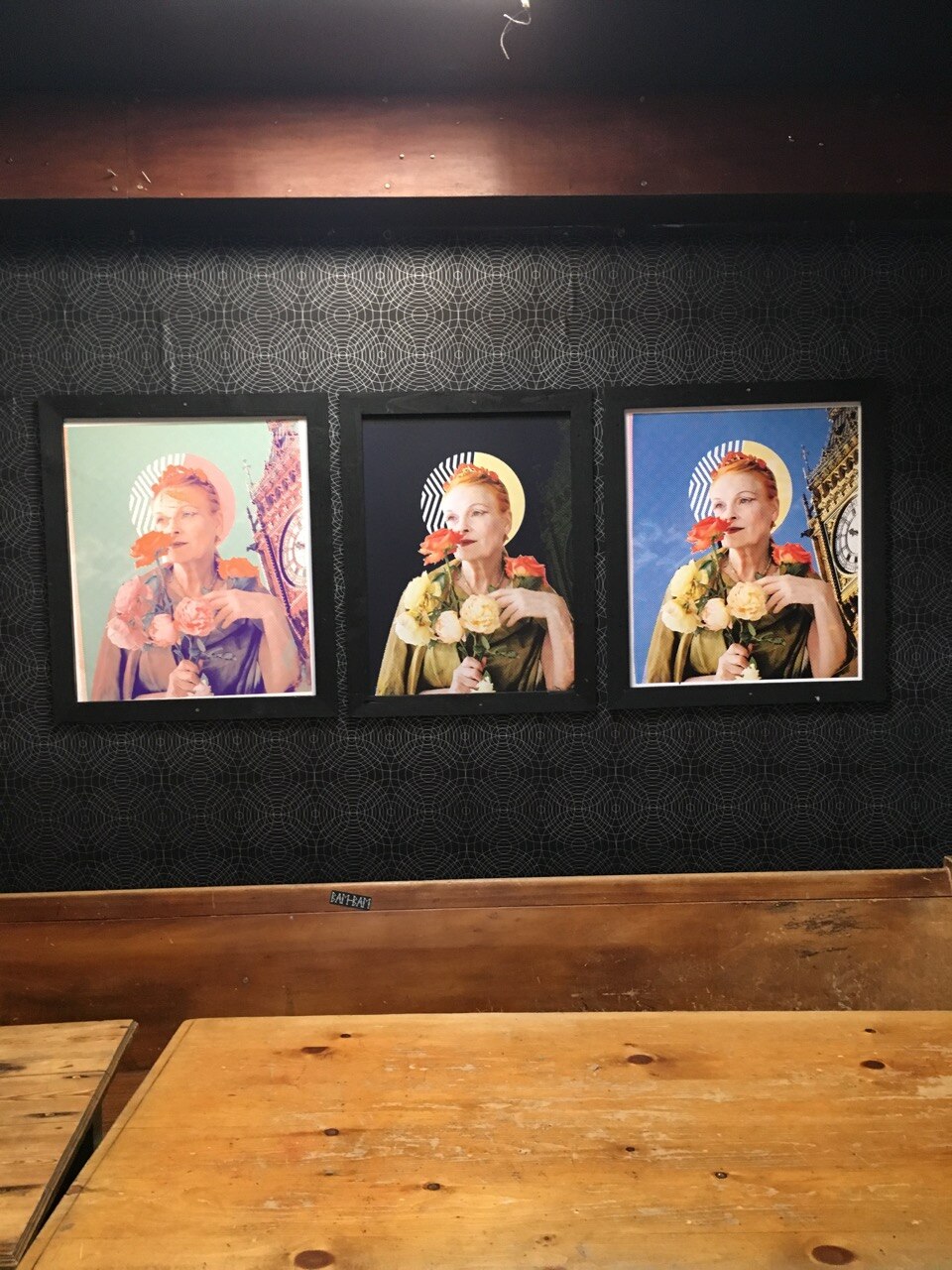 Three colourways of one of the exhibited prints hung together on a gallery wall
