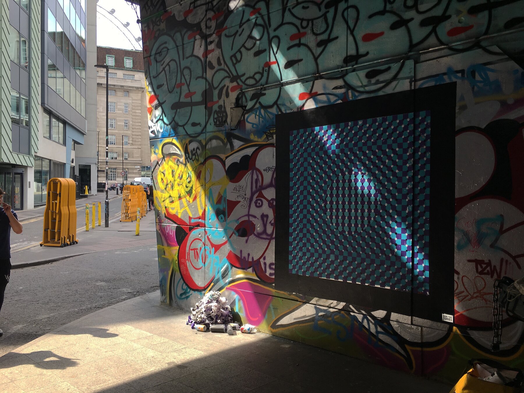 The Waterloo Paint Jam op-art mural at Leake Street tunnel, London Eye visible in the background